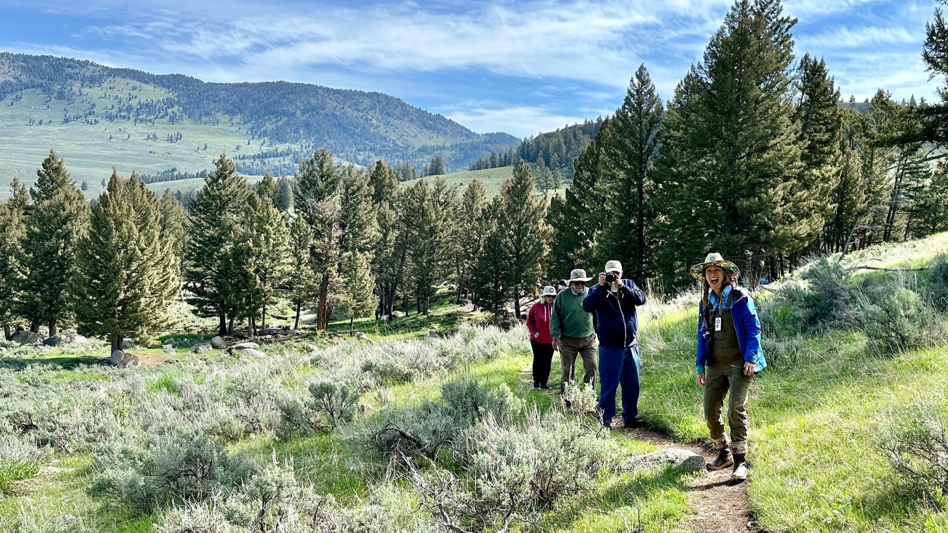 Charlie Reinertsen. Travelers in Yellowstone with expert guide