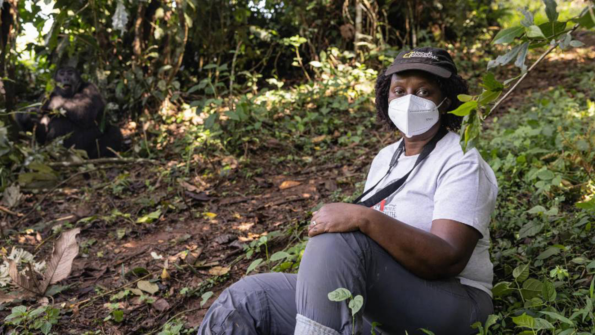 Woman in mask gorilla conservation